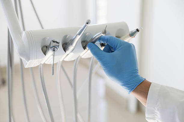 Professional Tooth Extraction technician working in Hobart, WI